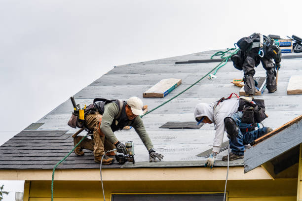 Professional Roofing technician working in West Decatur, PA
